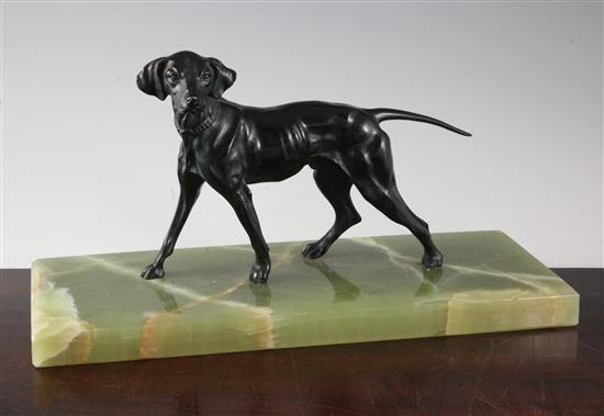 A 1920s bronze model of a hound, width 15.5in.